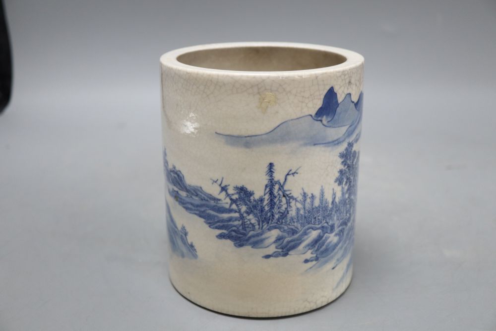 A Chinese blue and white crackle glaze brush pot, Kangxi mark but late 19th/early 20th century, height 13.5cm